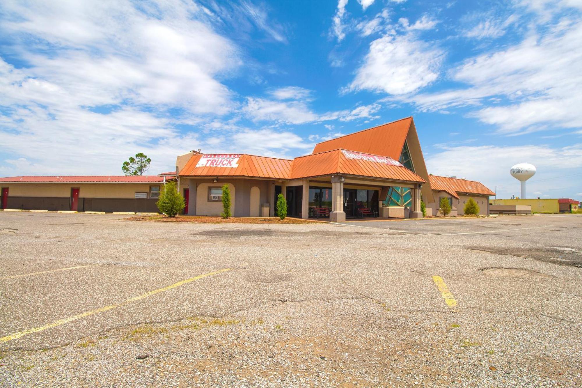 American Best Inn By Oyo I-35 Perry Near Lake Mcmurtry Exterior foto